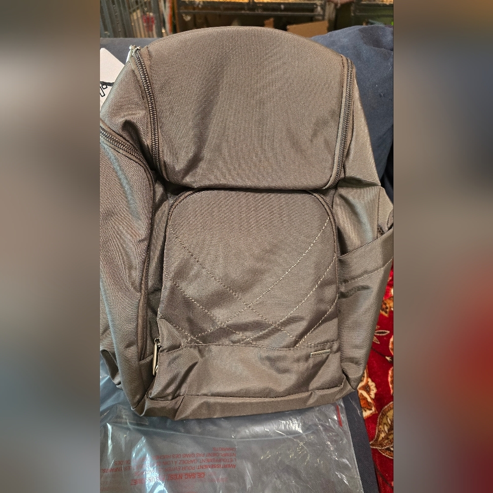 New In Package Travelon Anti Theft Classic Backpack in Nutmeg with Free Wallet